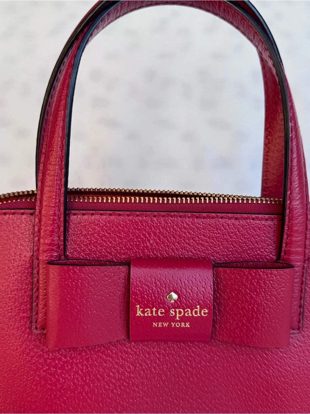 Kate Spade red Maise pebble Leather with Bow dome purse handbag
